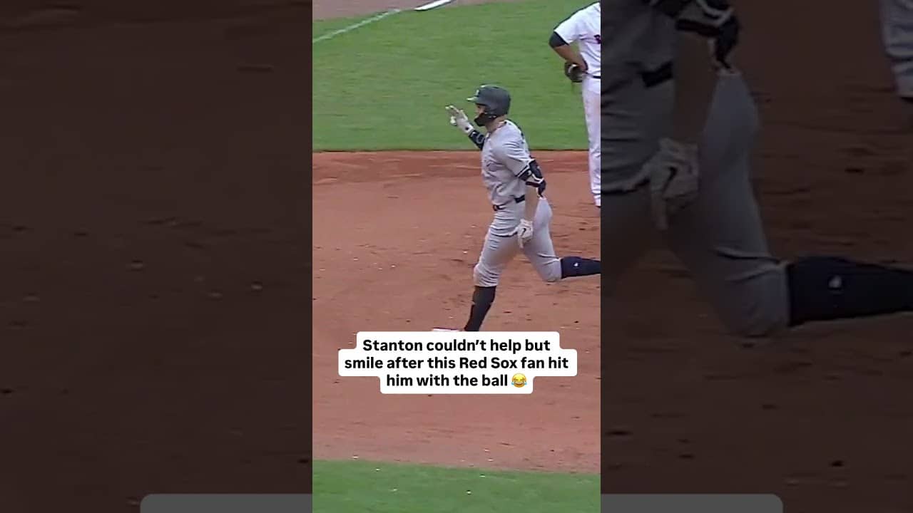 Giancarlo Stanton couldn’t help but smile after this Red Sox fan hit him with the ball 😂 #baseball