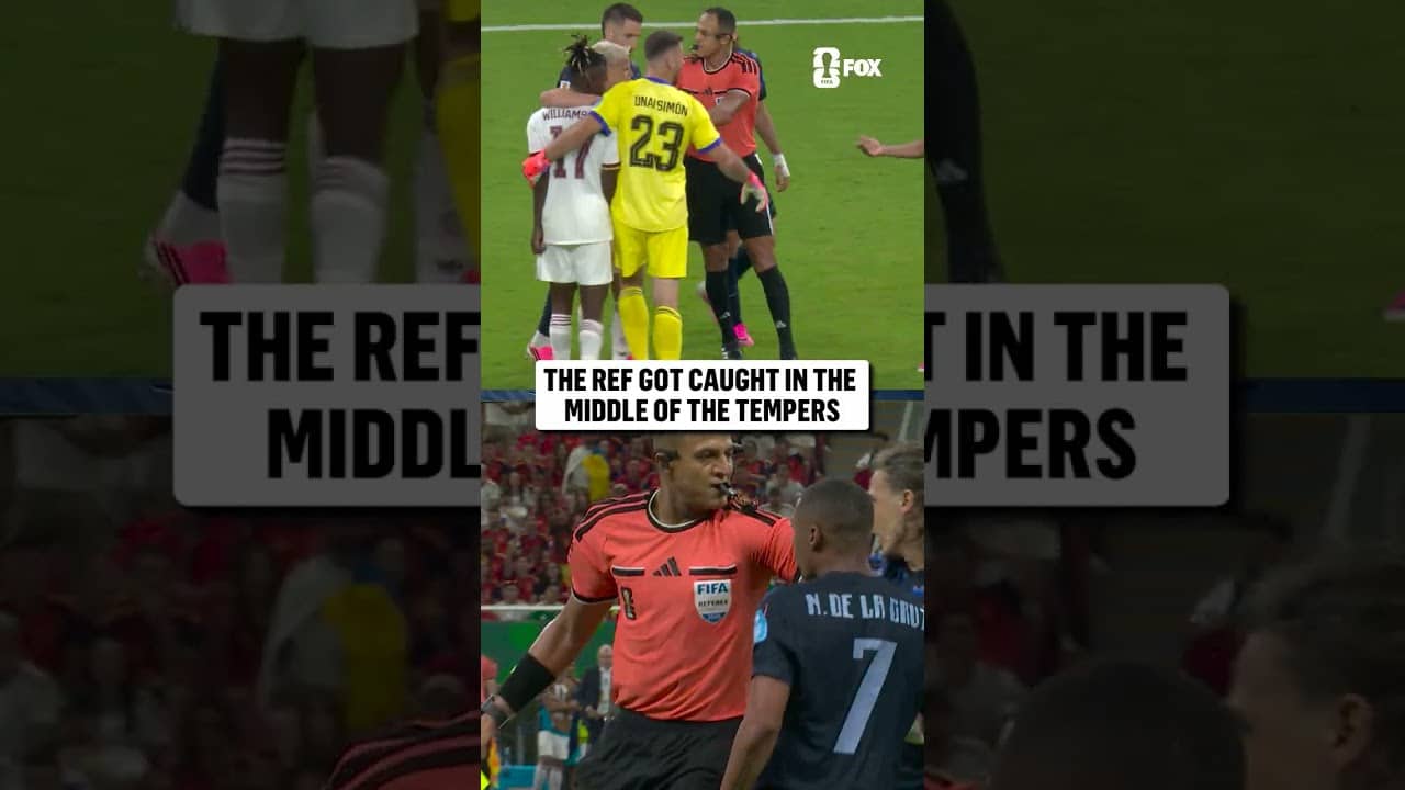 A heated interaction between Spain and Uruguay as the ref has to step in