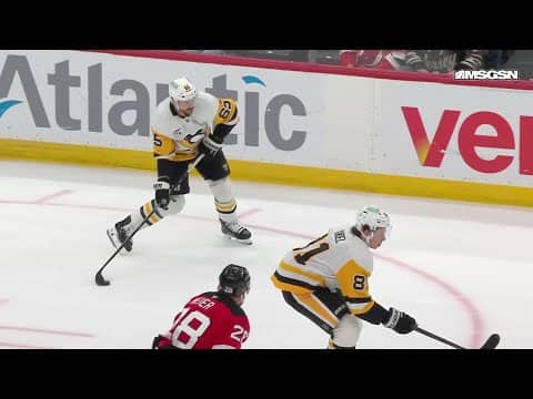 Erik Karlsson scores a goal against the New Jersey Devils