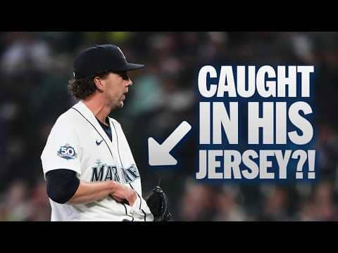 Logan Gilbert catches ball inside his jersey