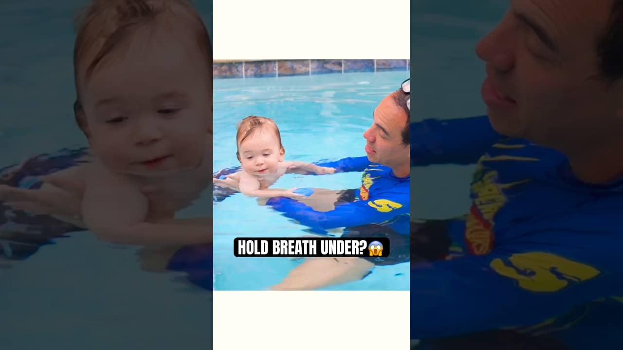 BABY HOLDING BREATH UNDERWATER