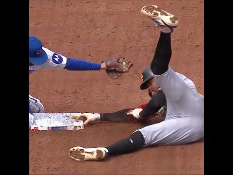 Oneil Cruz pulls off the slick swim move to avoid the tag! 🏊