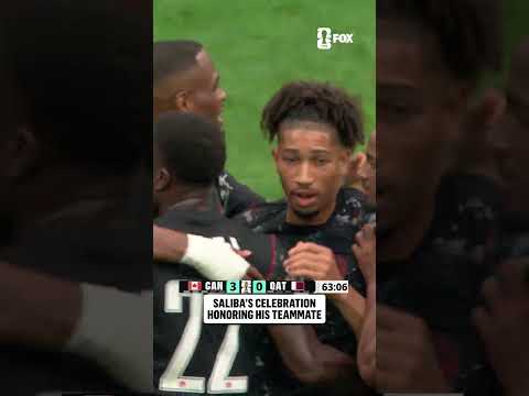 Nathan Saliba holds up a No. 8 after scoring in support of teammate Ismaël Koné