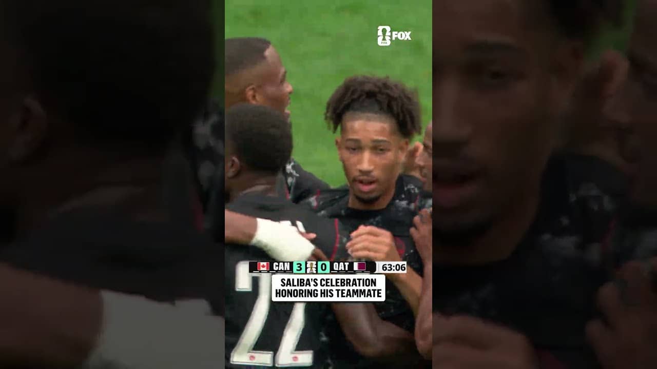 Nathan Saliba holds up a No. 8 after scoring in support of teammate Ismaël Koné