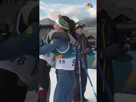 Regina Martinez Lorenzo's fellow competitors wait to congratulate her on the finish line!🥹 #Olympics