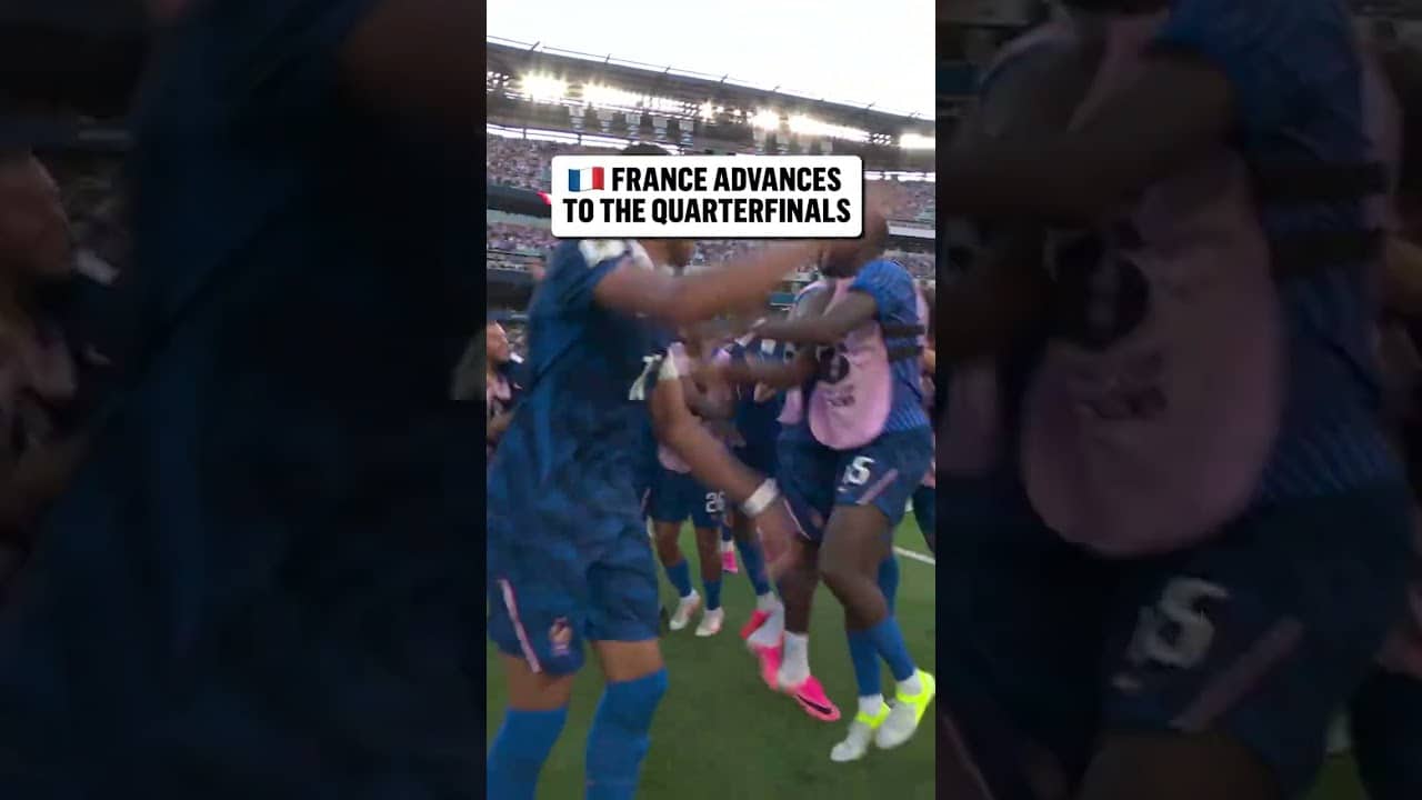 France celebrates with their fans in Philadelphia after beating Paraguay in the Round of 16