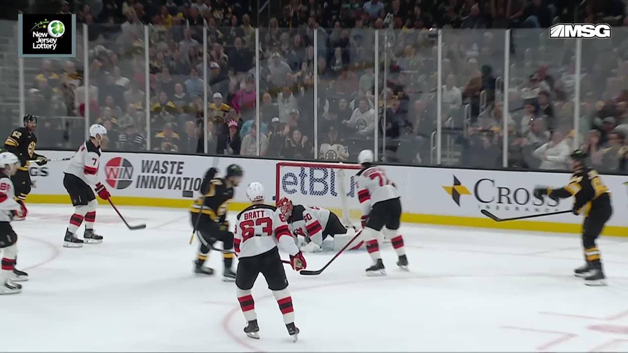 Mark Kastelic scores a goal against the New Jersey Devils