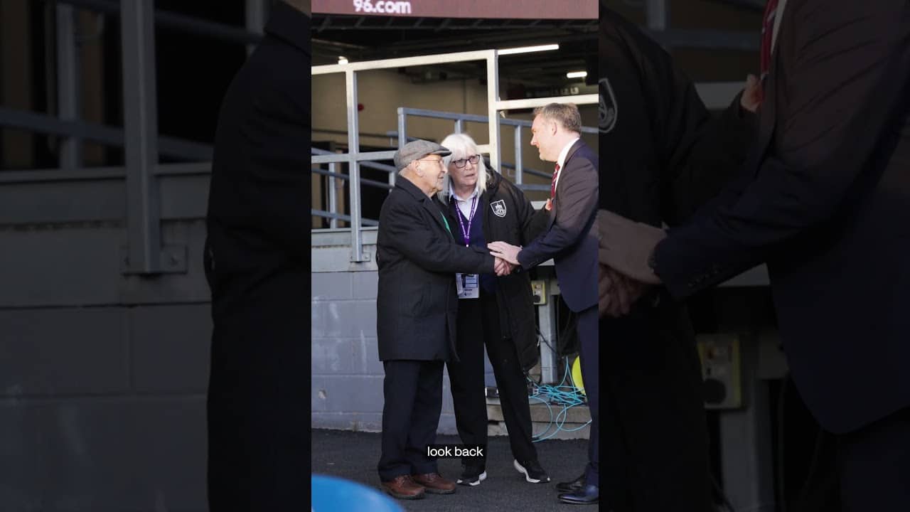 Trevor Meredith, Clarets legend, receiving his long-awaited 1959/60 winners medal at Turf Moor
