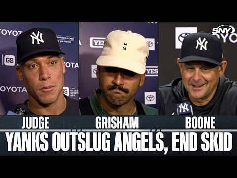 Aaron Boone, Aaron Judge and Trent Grisham react to the Yankees wild win over the Angels