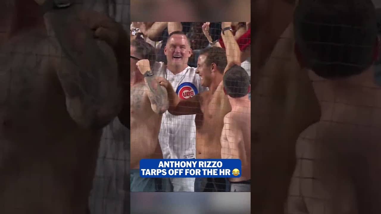 Anthony Rizzo goes TARPS OFF after Ian Happ LAUNCHES a home run to the back of the bleachers! 🚫👕