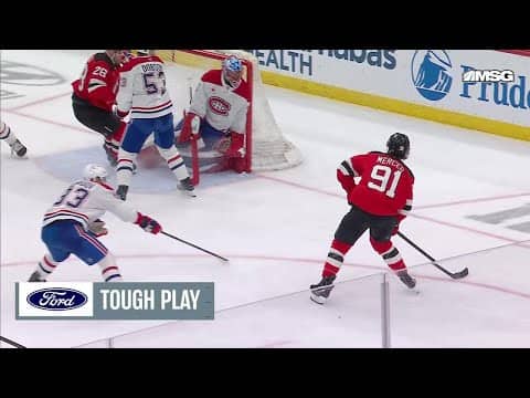 Dawson Mercer scores a goal against the Montréal Canadiens