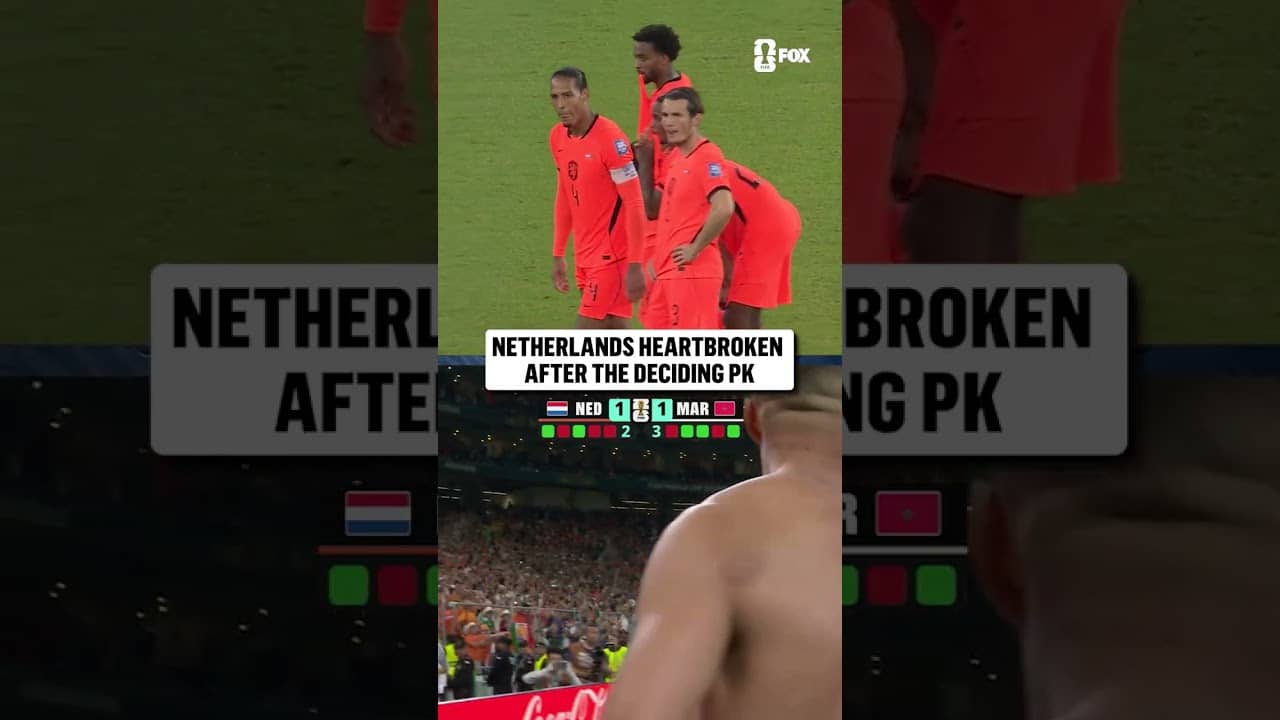 Netherlands players react to Morocco's winning penalty