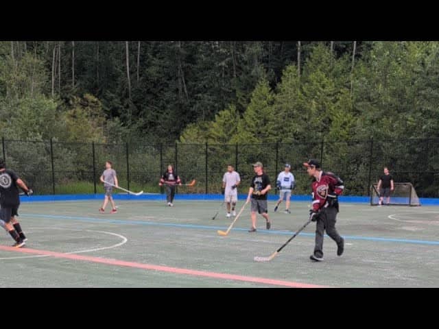 The Hockey Guy is playing ball hockey