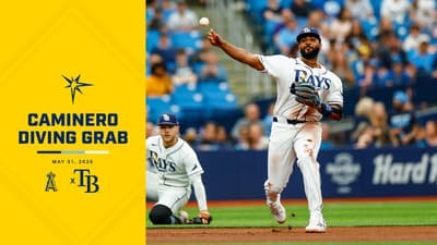 Junior Caminero slides to make the stop and throw vs the Los Angeles Angels